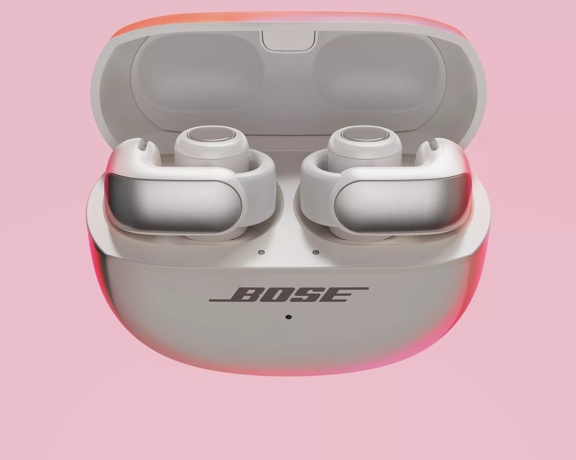 Bose Ultra Open Earbuds in their charging case.