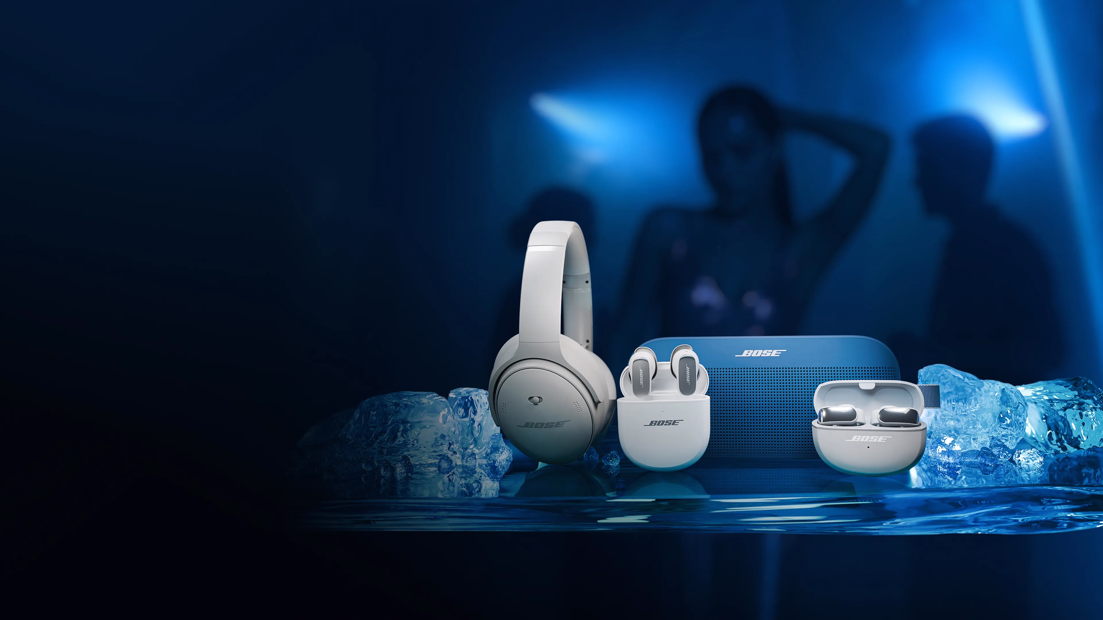 Bose QuietComfort Headphones, QuietComfort Ultra Earbuds (2nd Gen), SoundLink Flex Portable Speaker (2nd Gen), and Ultra Open Earbuds surrounded by ice.