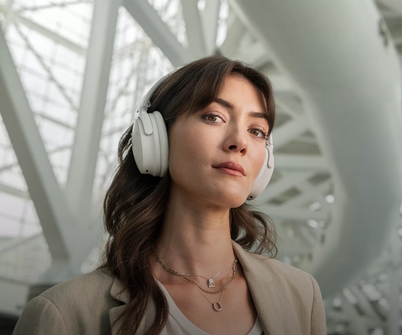 Woman wearing QuietComfort Headphones in an airport