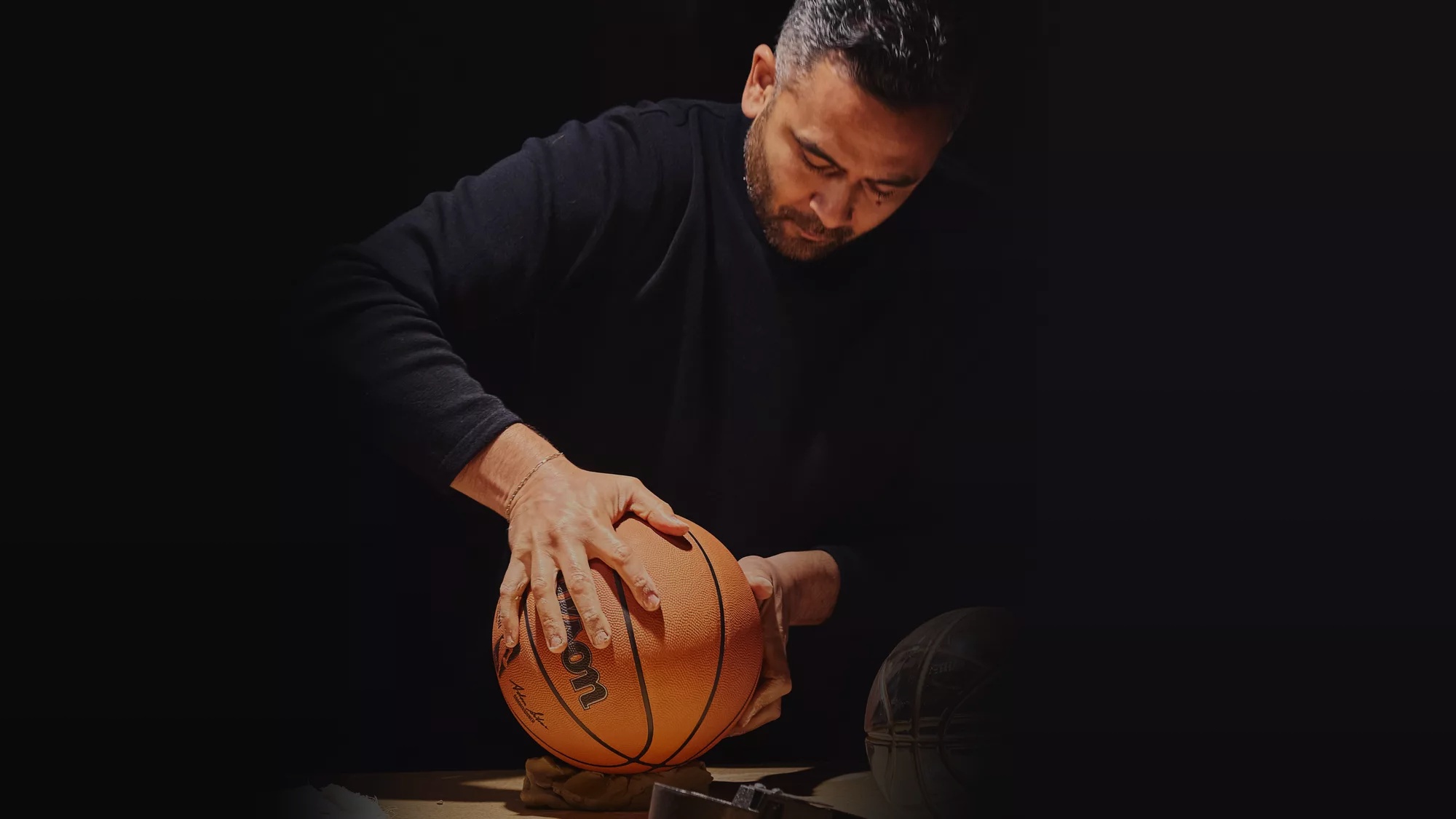 Victor Solomon holding a basketball