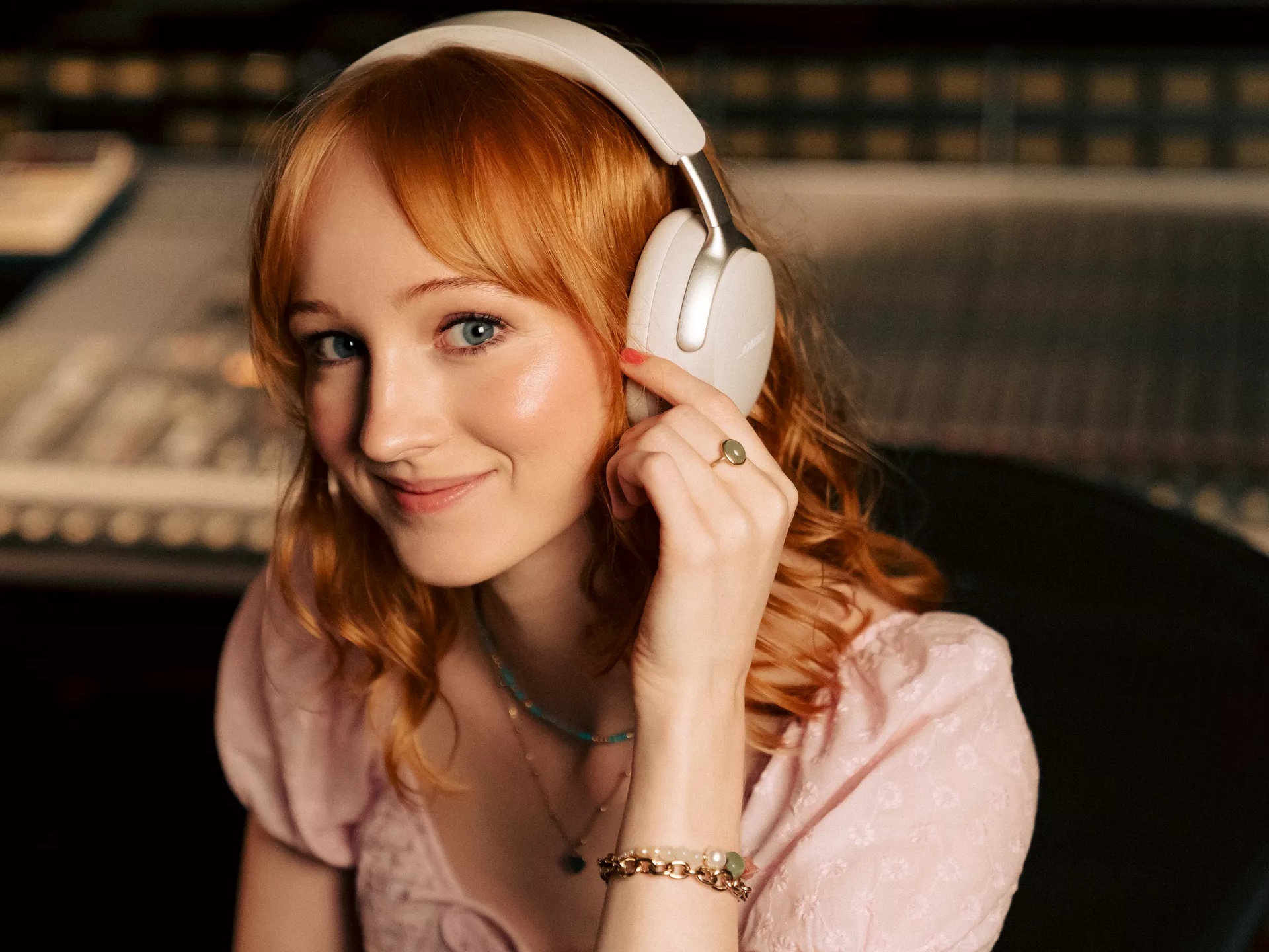 Megan Lewis wearing Bose QuietComfort Ultra Headphones