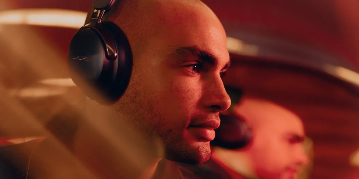 Man wearing Bose QuietComfort Ultra Headphones (2nd Gen).