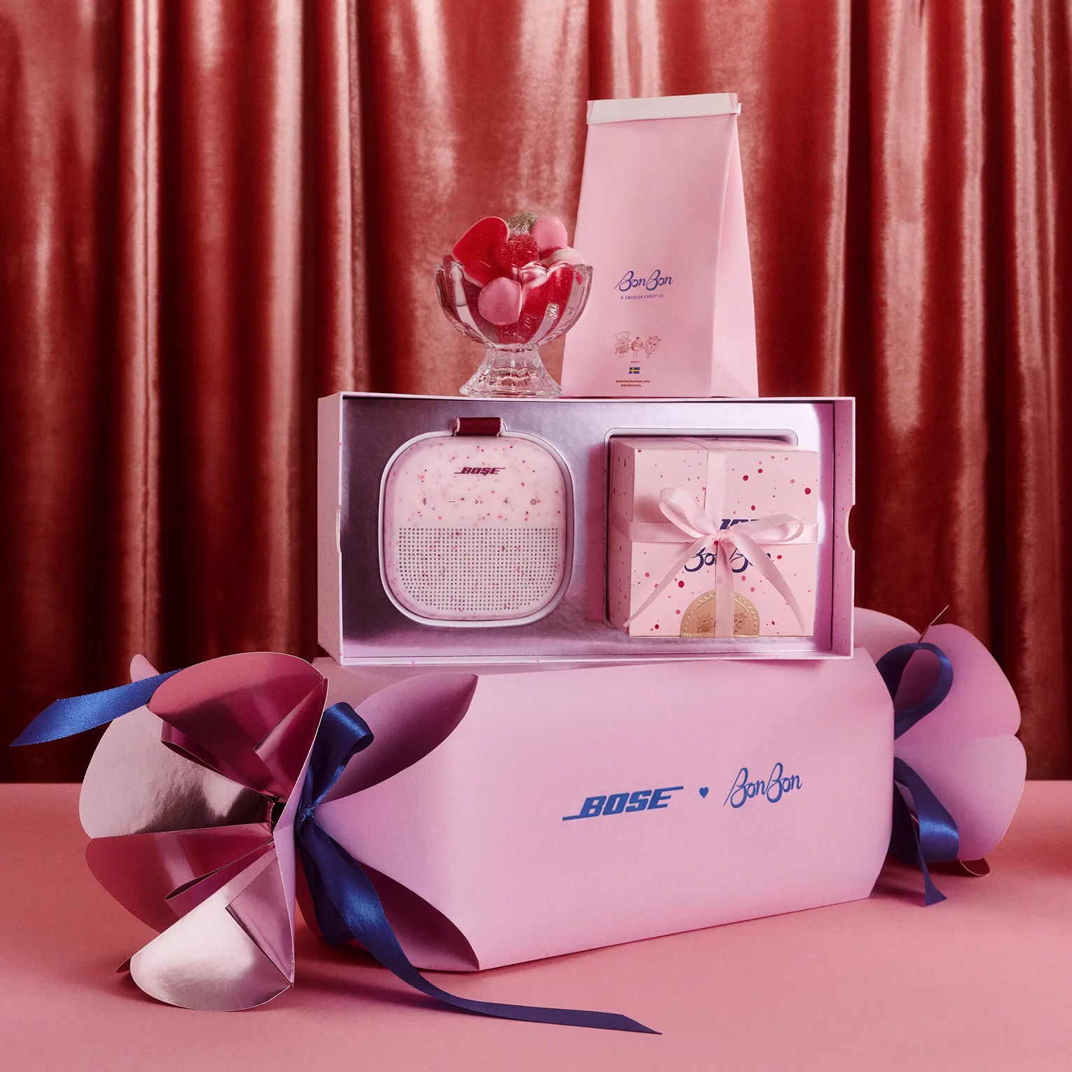 Bose SoundLink Micro Portable Speaker (2nd Gen) in Petal Pink and BonBon candy together in a specially designed box. 