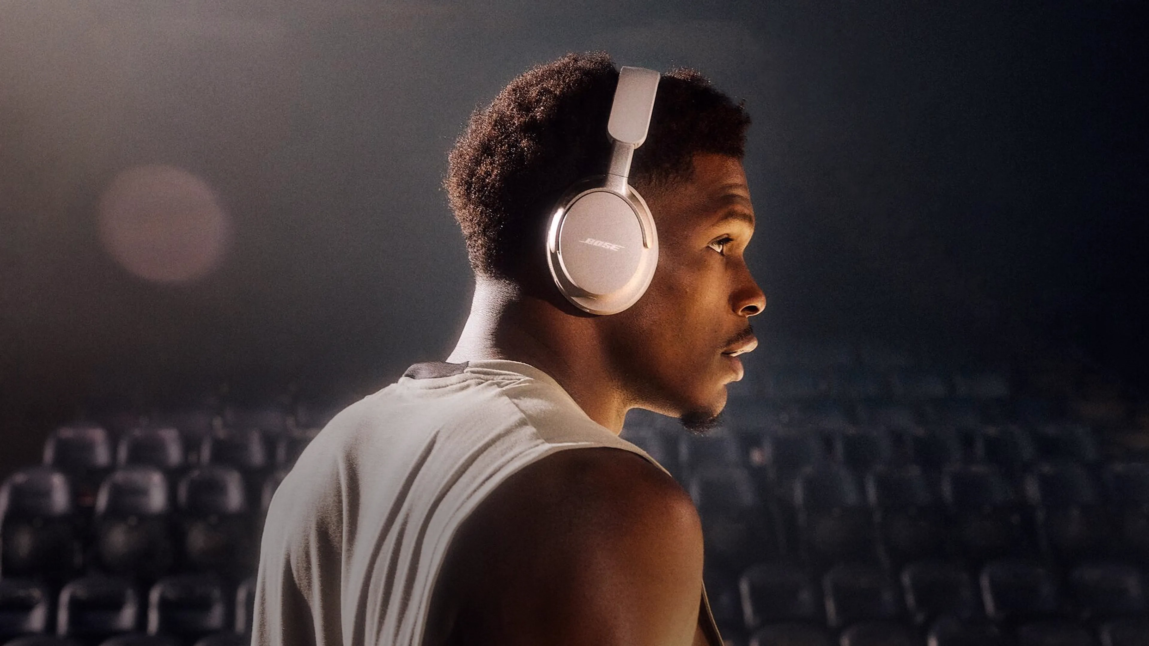 Basketball star Ant Edwards wearing Bose QuietComfort Ultra Headphones.
