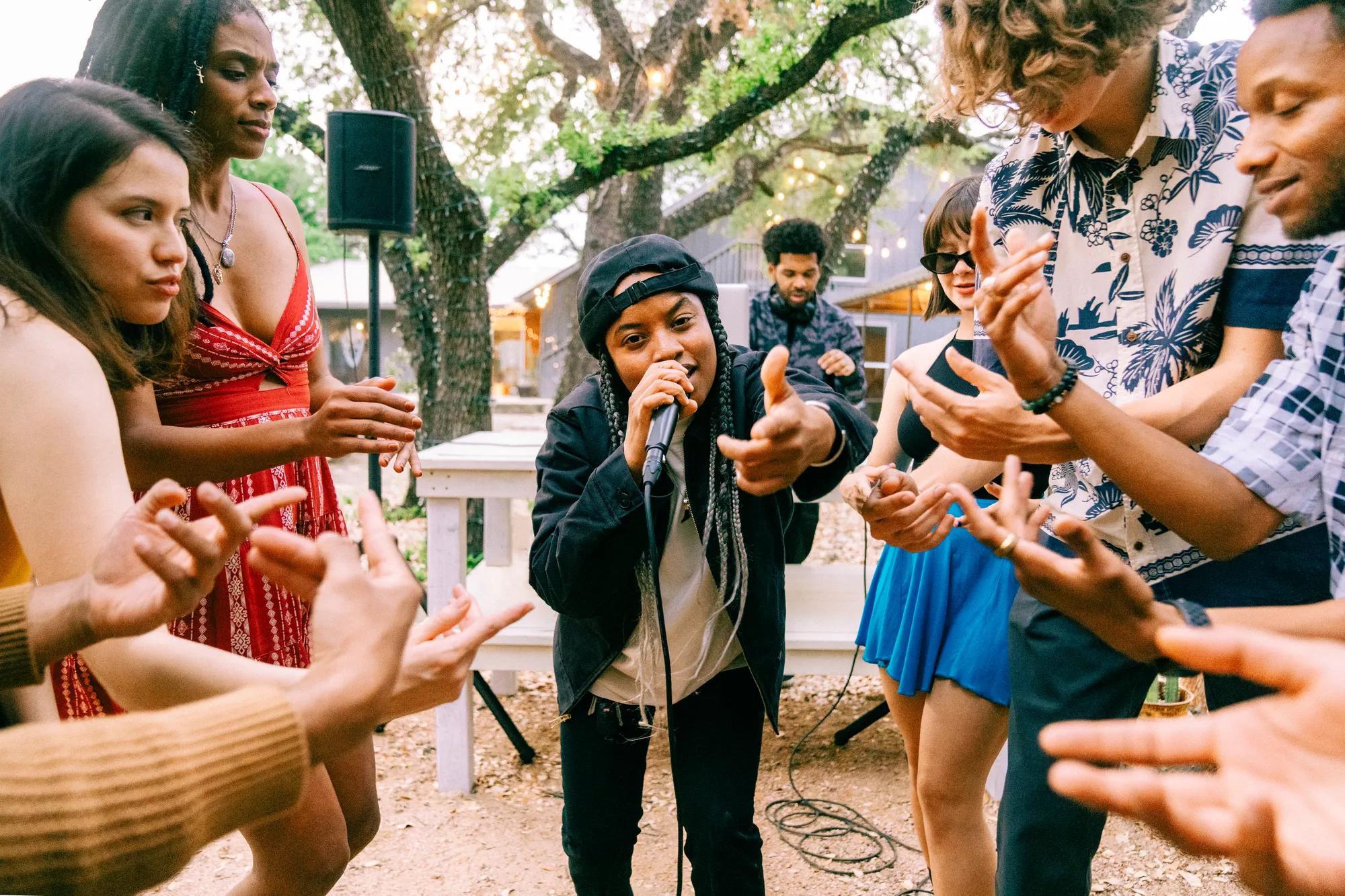 Dougie Do and Megz Kelli of the Hip Hop group Magna Carda performing with the Bose S1 Pro+ Portable Bluetooth Speaker System