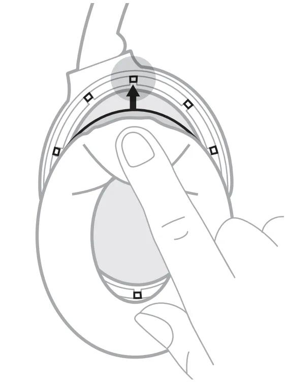 cushion mounting flange under earcup tab