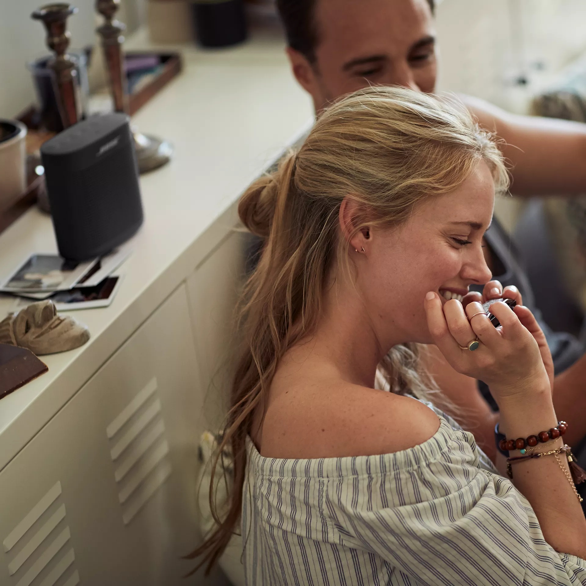 Couple listening to a SoundLink Color II speaker