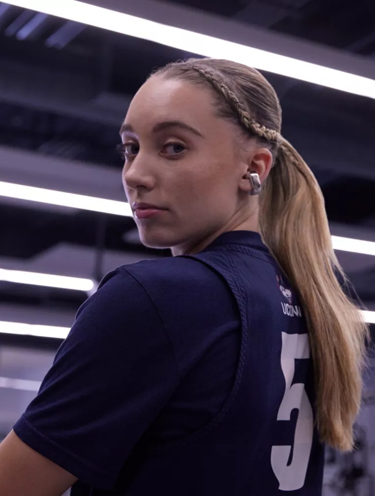 Paige Bueckers wearing Bose Ultra Open Earbuds