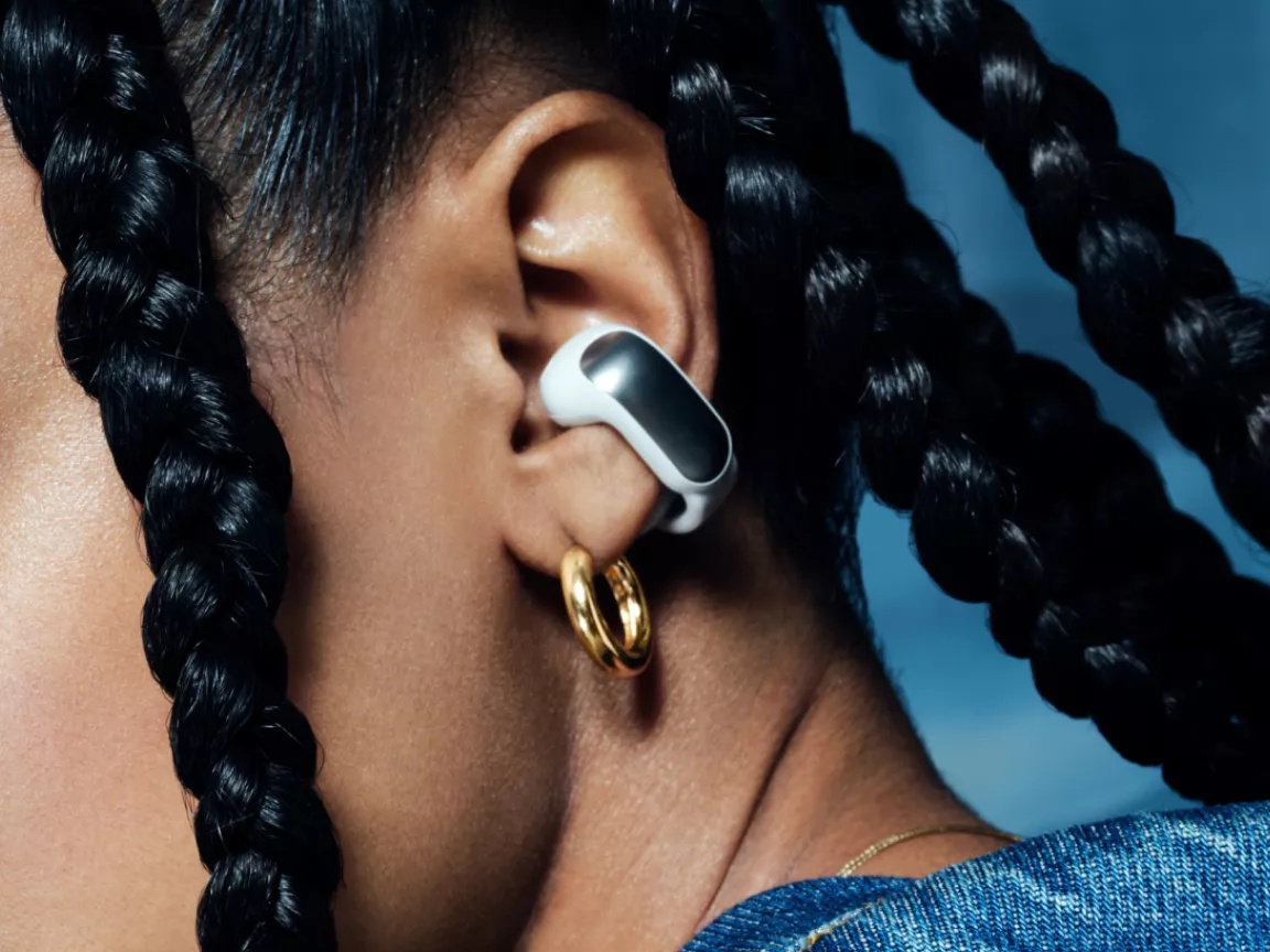 Person wearing Bose Ultra Open Earbuds