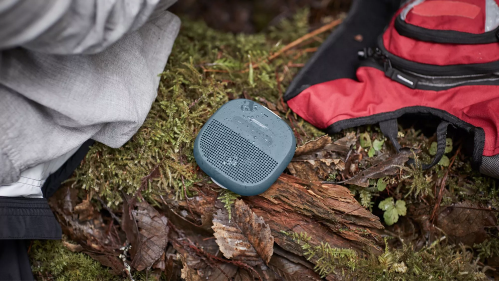 Bose SoundLink Micro Bluetooth Speaker outside on the ground