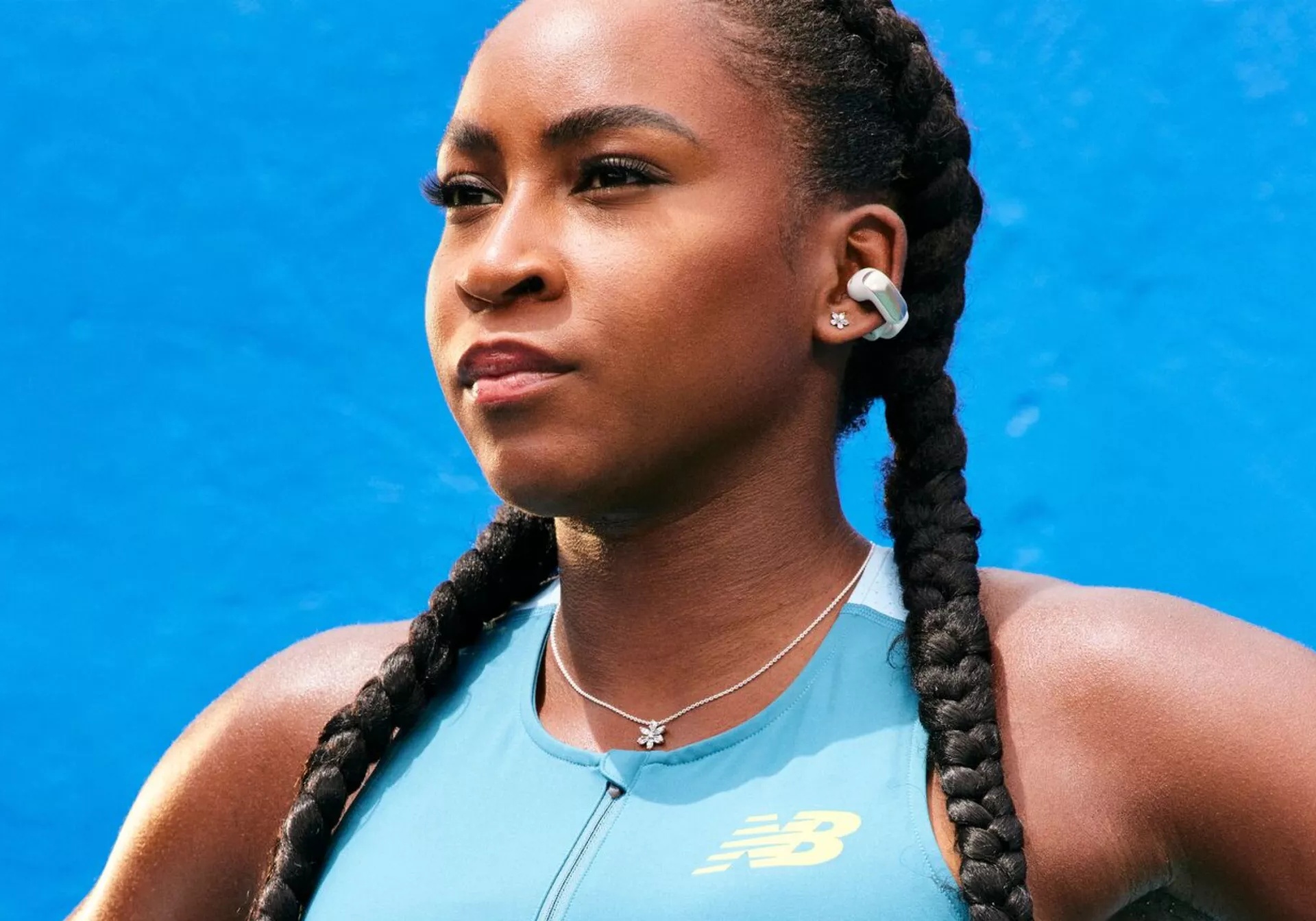 Coco Gauff wearing Bose Ultra Open Earbuds