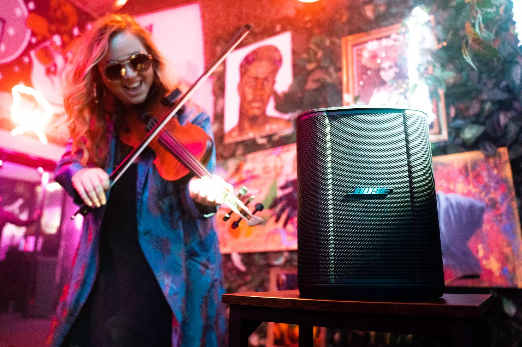 Violinist using the Bose S1 Pro+ Portable Bluetooth Speaker System