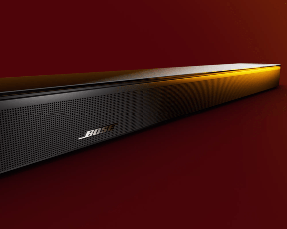 Bose Smart Soundbar 900 on a TV stand
