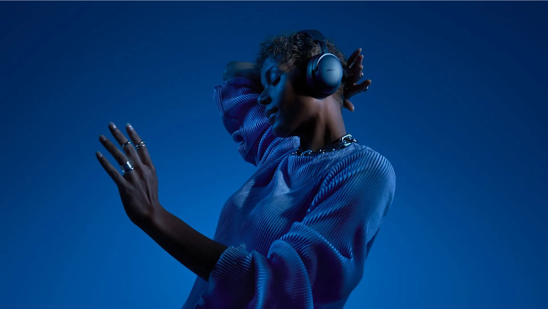 Woman wearing Bose QuietComfort Ultra Headphones