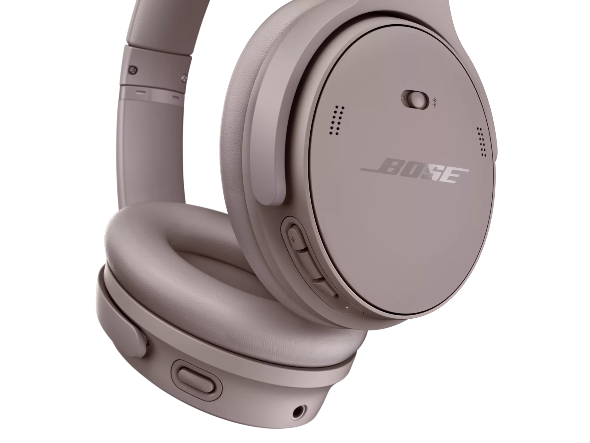 Close-up of Bose QuietComfort Headphones in Sandstone, highlighting the earcups, buttons, ports and premium design details.