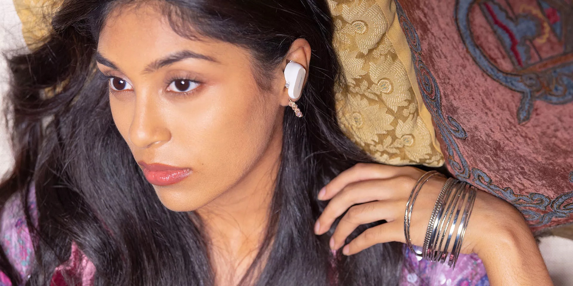 Woman wearing Bose QuietComfort Earbuds II