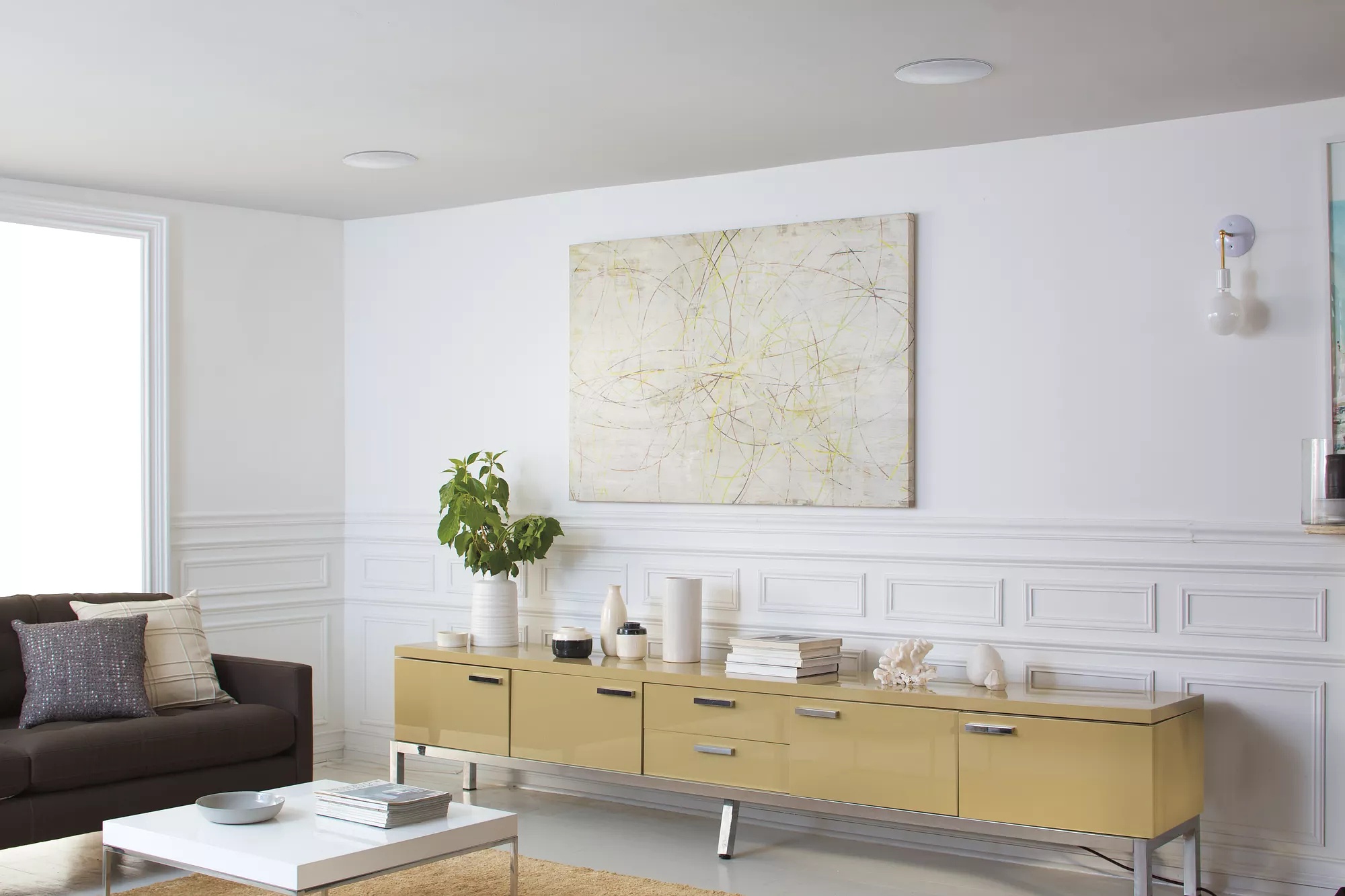 Well lit living room with Virtually Invisible 791 In-ceiling Speakers II