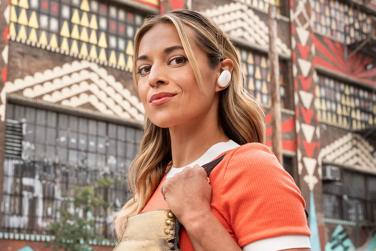 Woman wearing Bose QuietComfort Earbuds