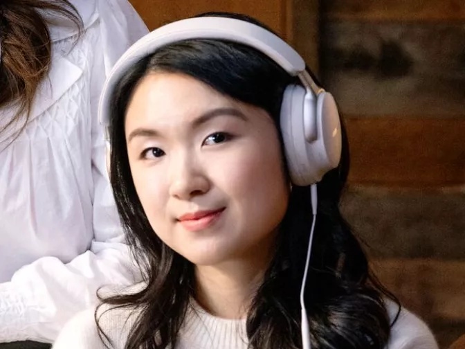 Eunike wearing Bose QuietComfort Ultra Headphones