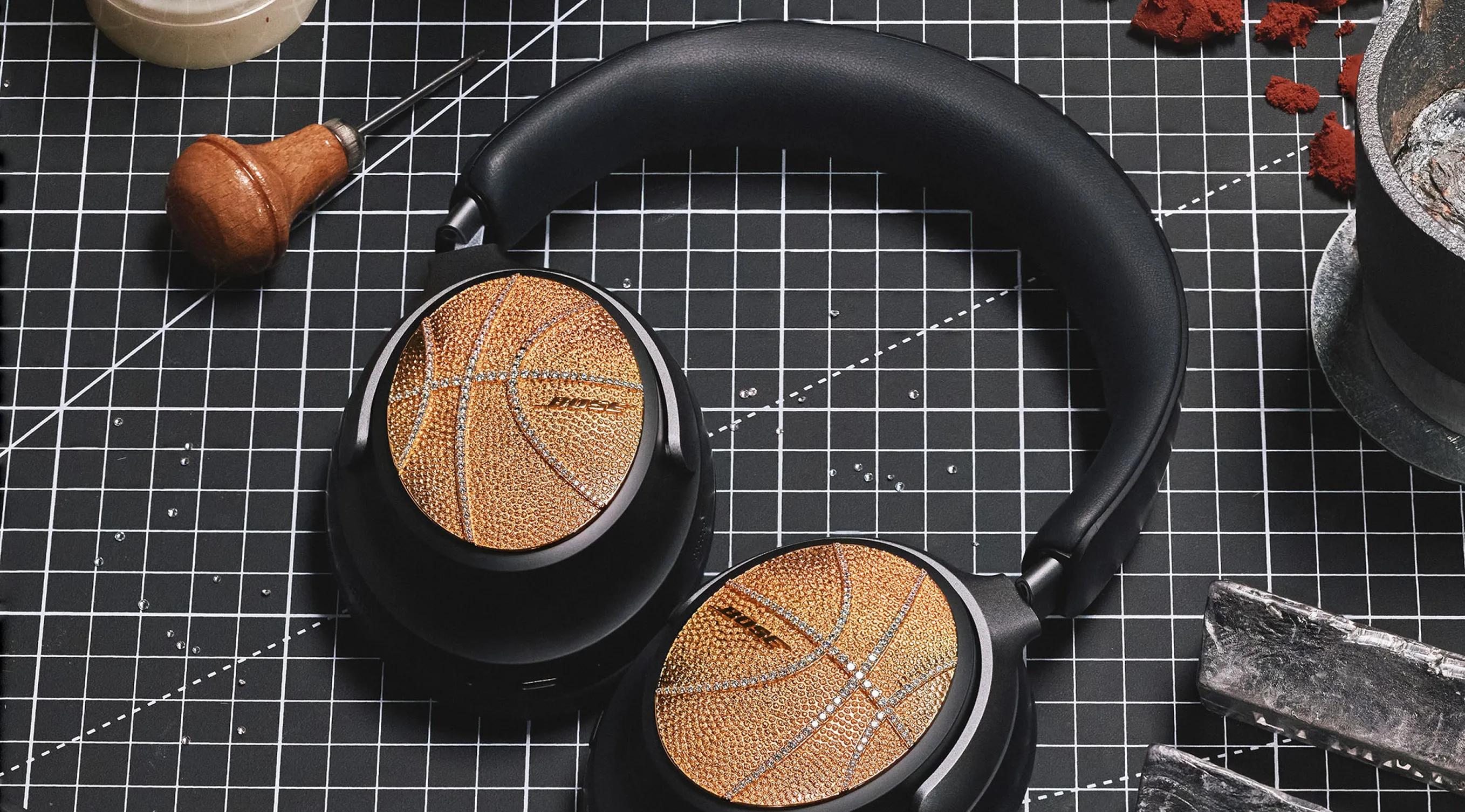 Bose QuietComfort Ultra Headphones designed by Victor Solomon on a drafting board.