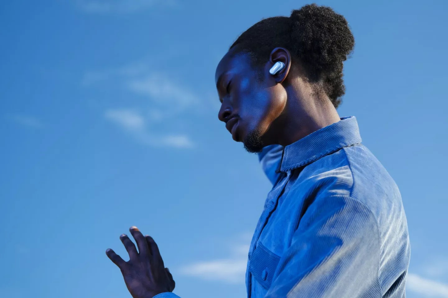 Man wearing Bose QuietComfort Ultra Earbuds