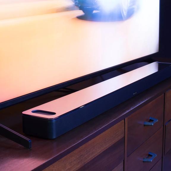 Bose Smart Soundbar 900 on a TV stand