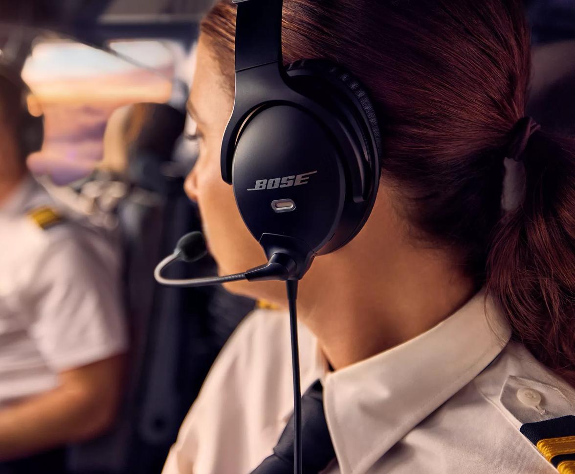 Female pilot wearing the Bose A30 Aviation Headset