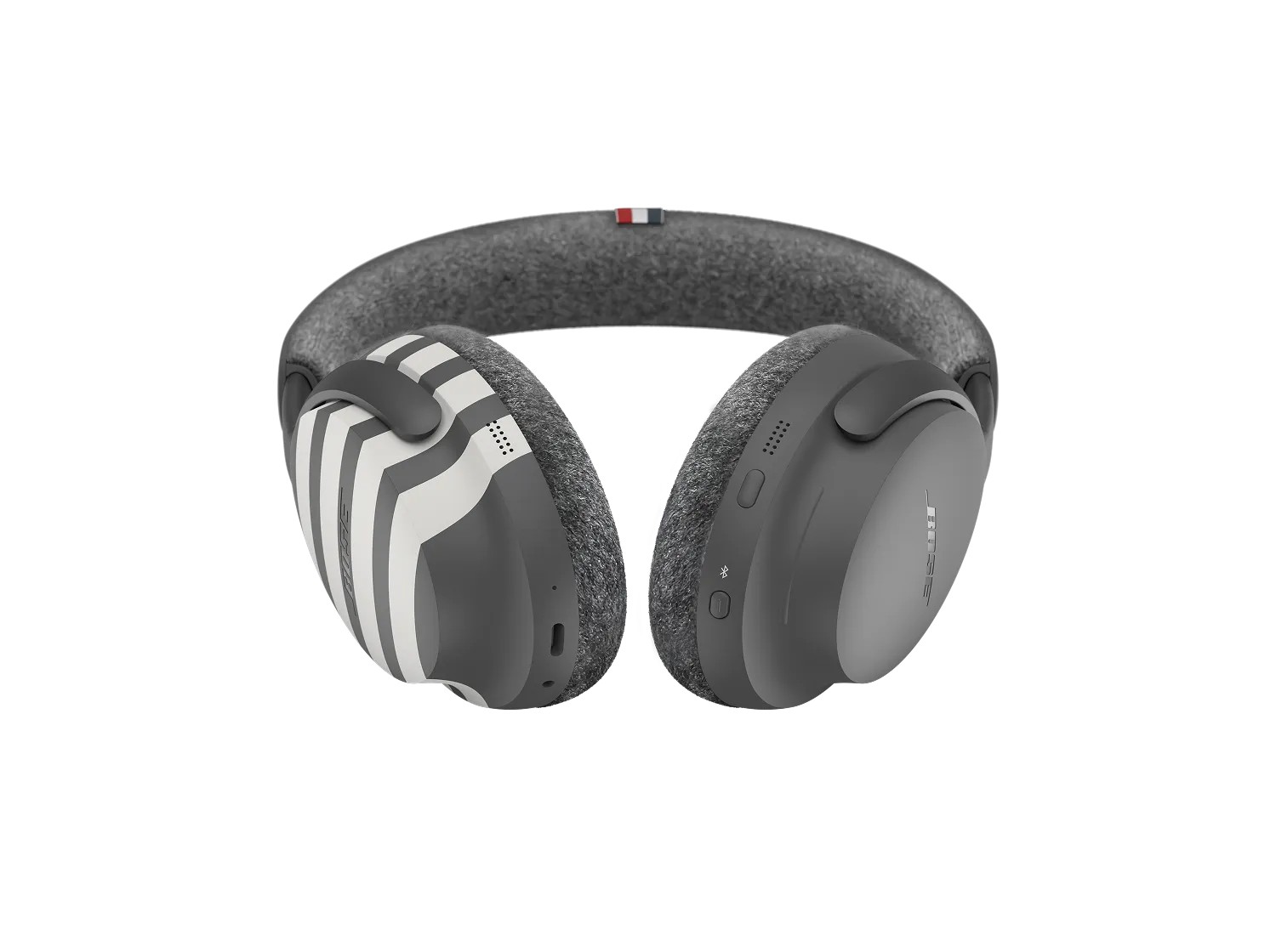 Bose x Thom Browne QuietComfort Ultra headphones seen from above showing the cashmere cushions and striped ear cup