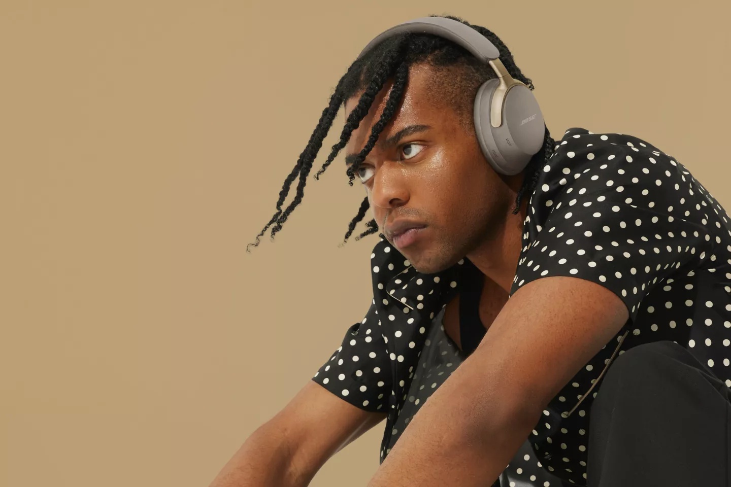 Man wearing Bose QuietComfort Ultra Headphones Limited Edition
