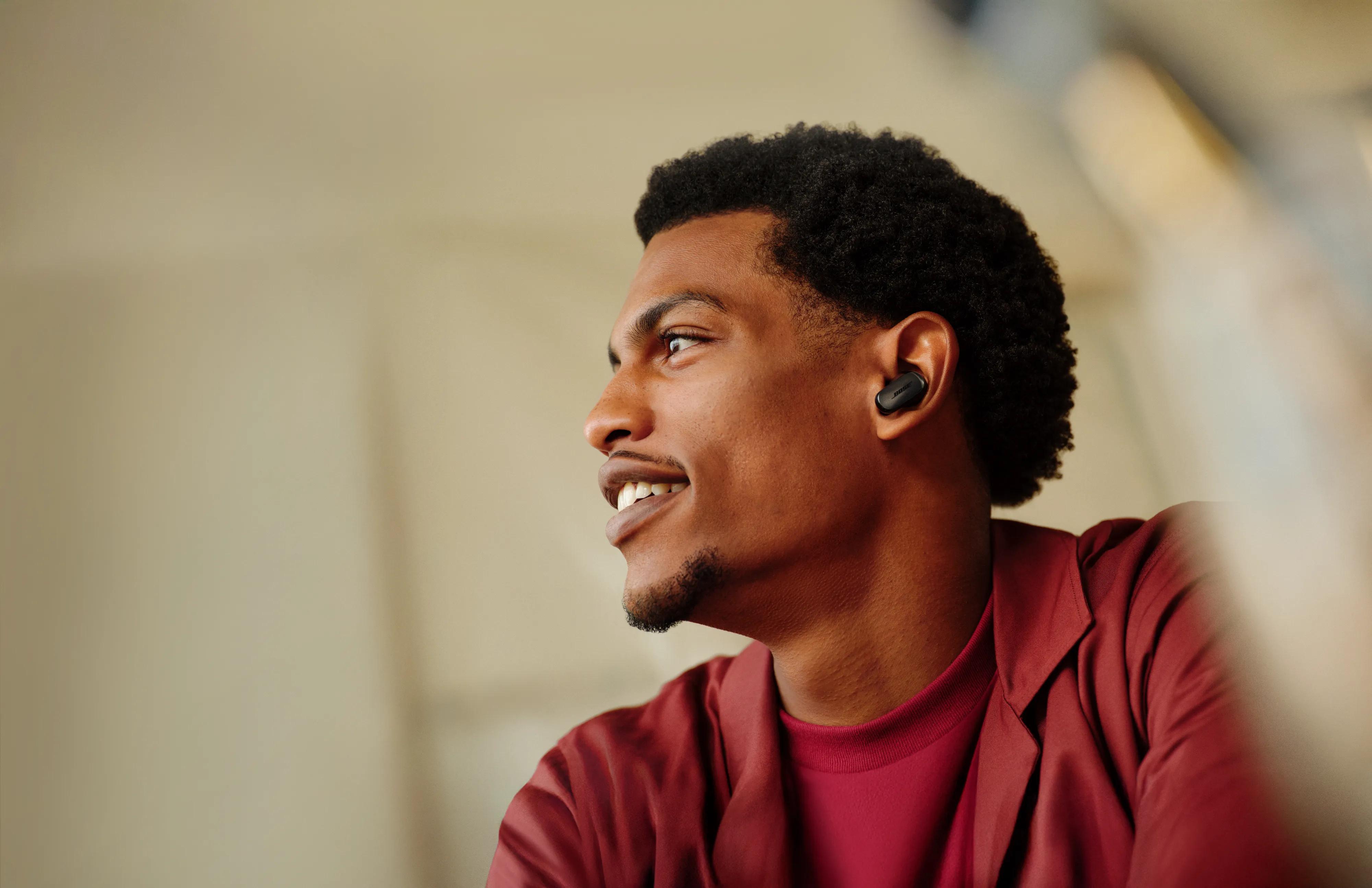 Man wearing Bose QuietComfort Ultra Earbuds (2nd Gen).