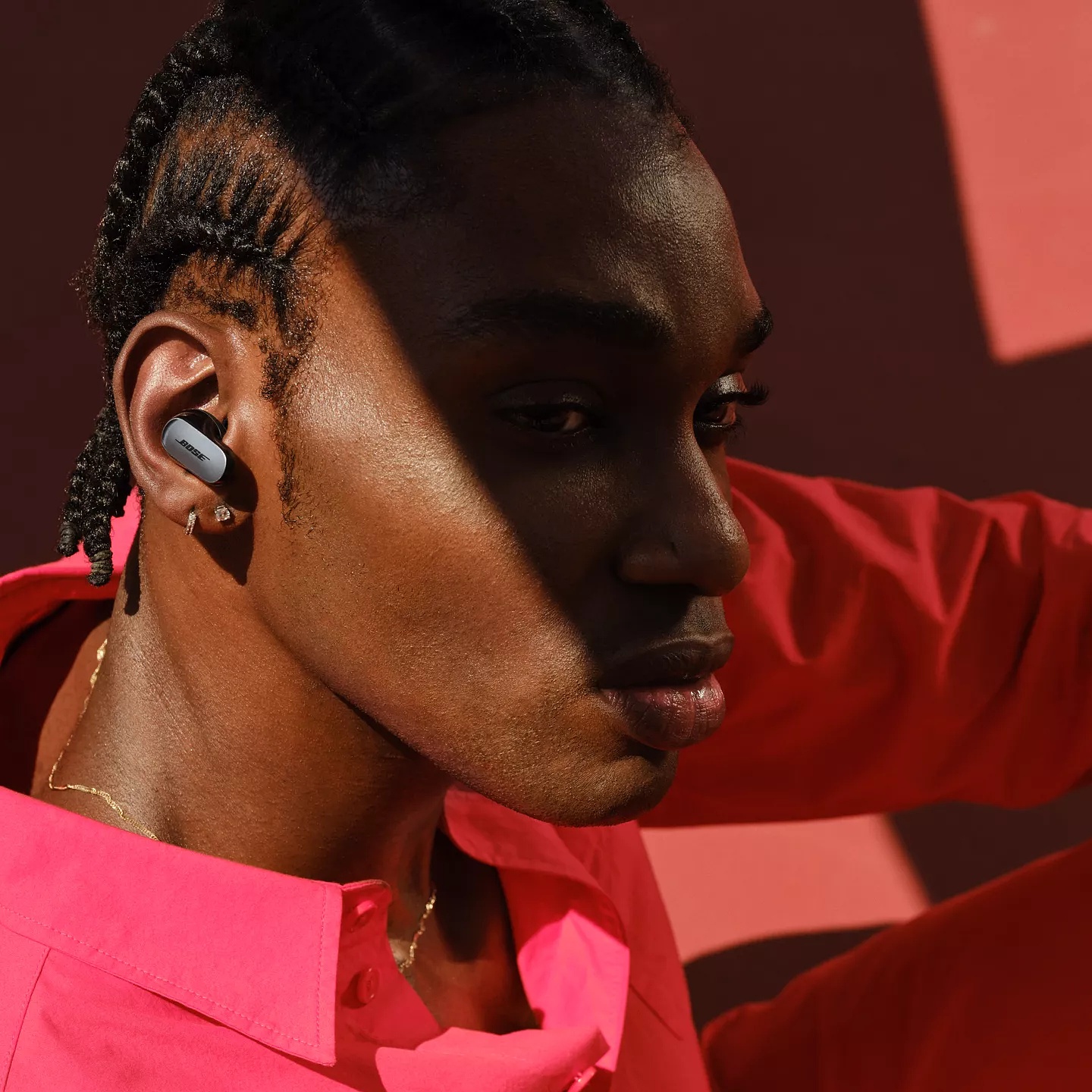 Man wearing Bose QuietComfort Ultra Earbuds