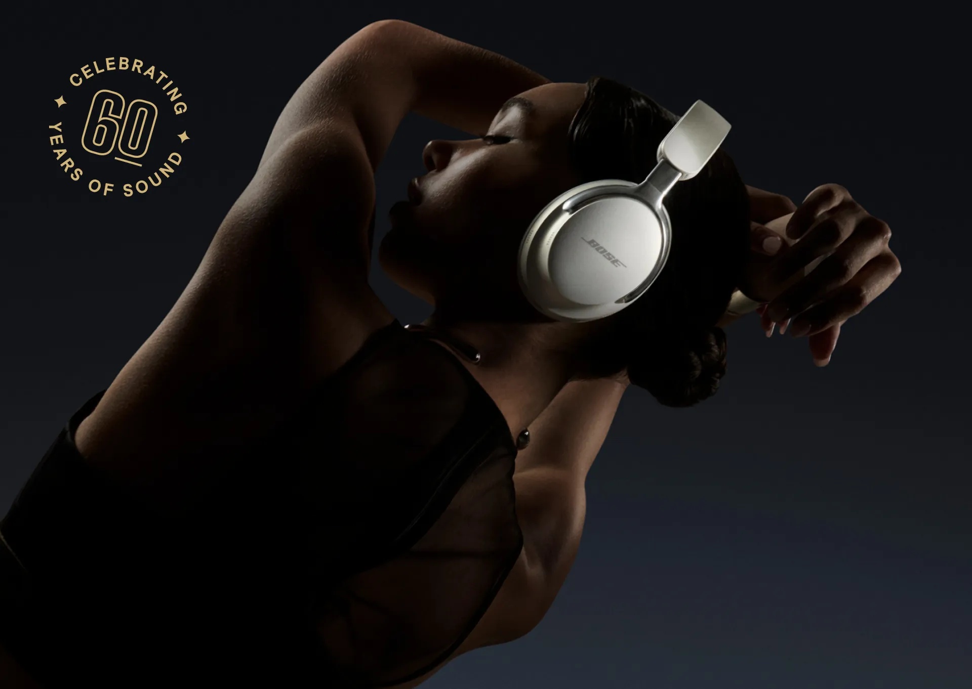 Woman wearing Diamond 60th Edition Bose QuietComfort Ultra Headphones.