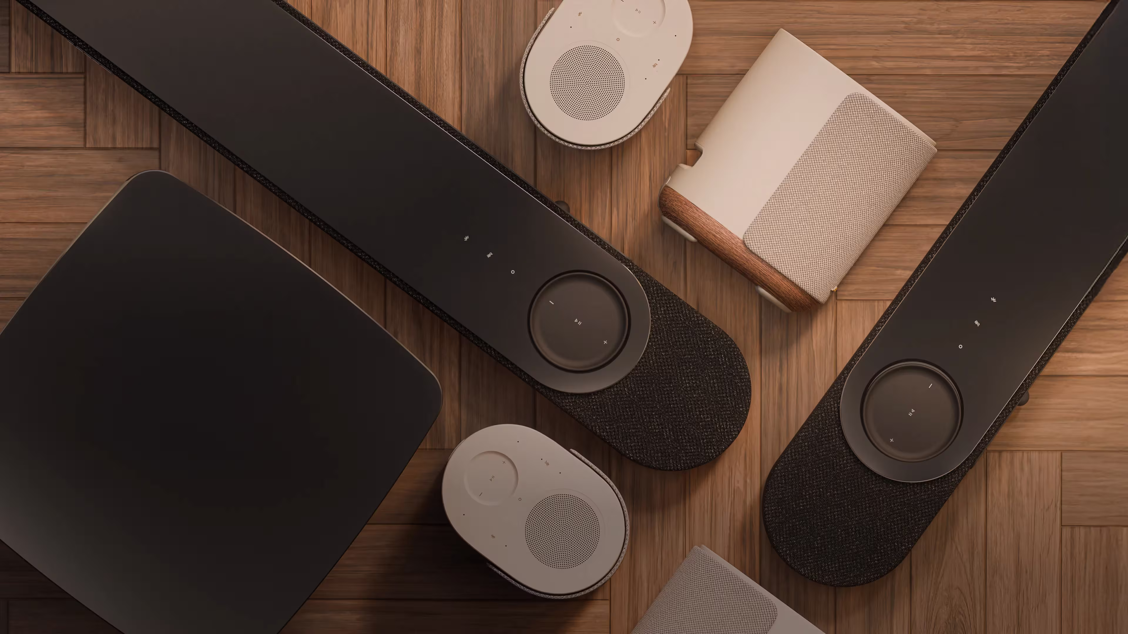 A display of Bose Lifestyle Ultra Soundbars, Lifestyle Ultra Speakers, and Lifestyle Ultra Subwoofer.
